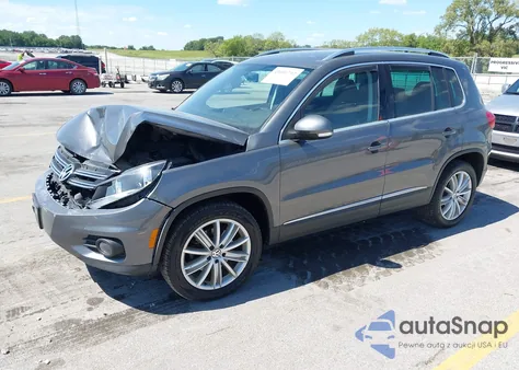 2014 Volkswagen Tiguan Sel from USA, damaged, VIN WVGBV3AXXEW607031